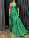 Emerald Green Plunging Neckline Gown With Pleated Skirt And Side Slit
